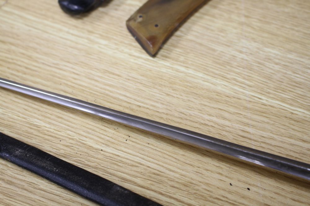 A cut steel dress sword by Ede & Ravenscroft of London and two brass hilted dress swords
